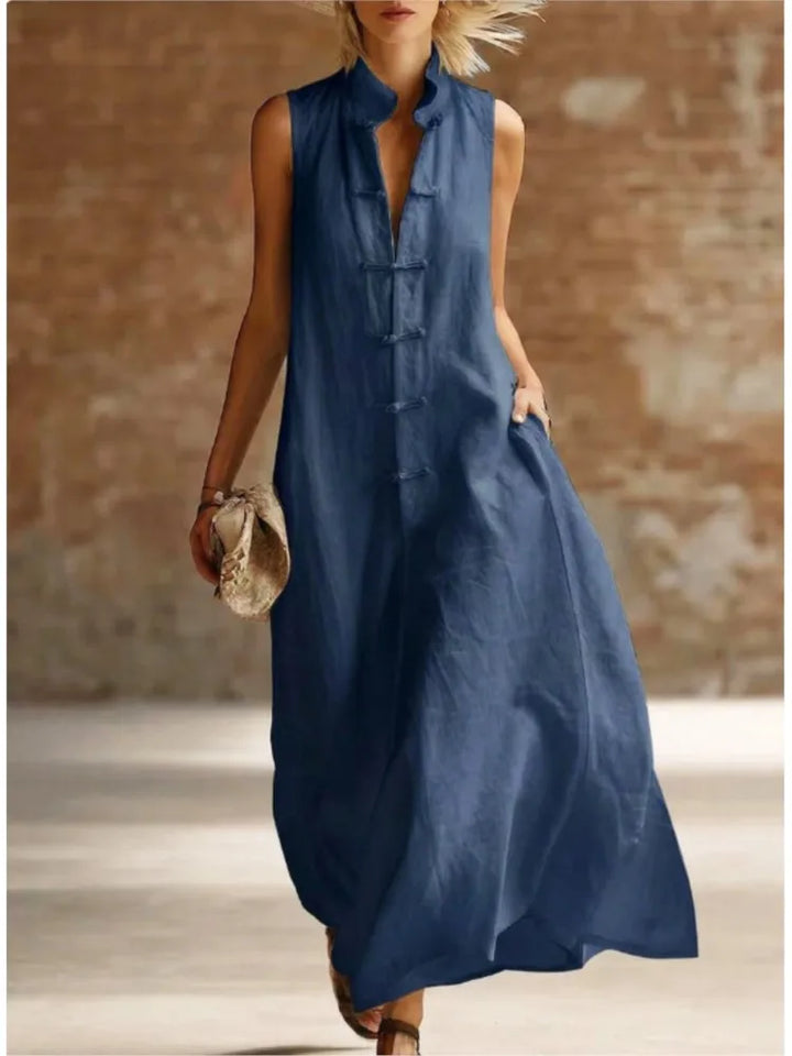 Women's sleeveless collared maxi shirt dress. Casual yet elegant, great for summer fashion.