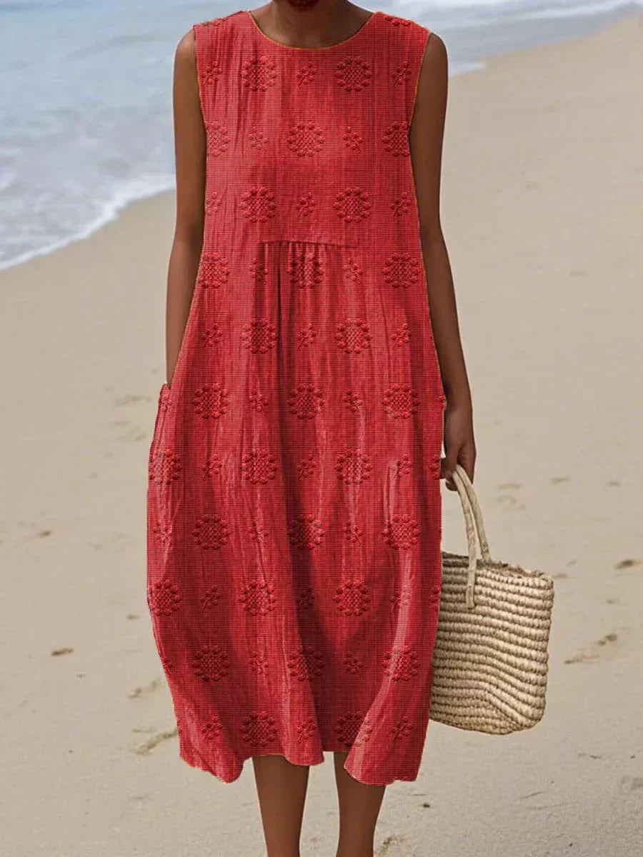 Elegant women's sleeveless midi dress with pockets. Perfect for summer, casual outings, or a comfortable everyday look.