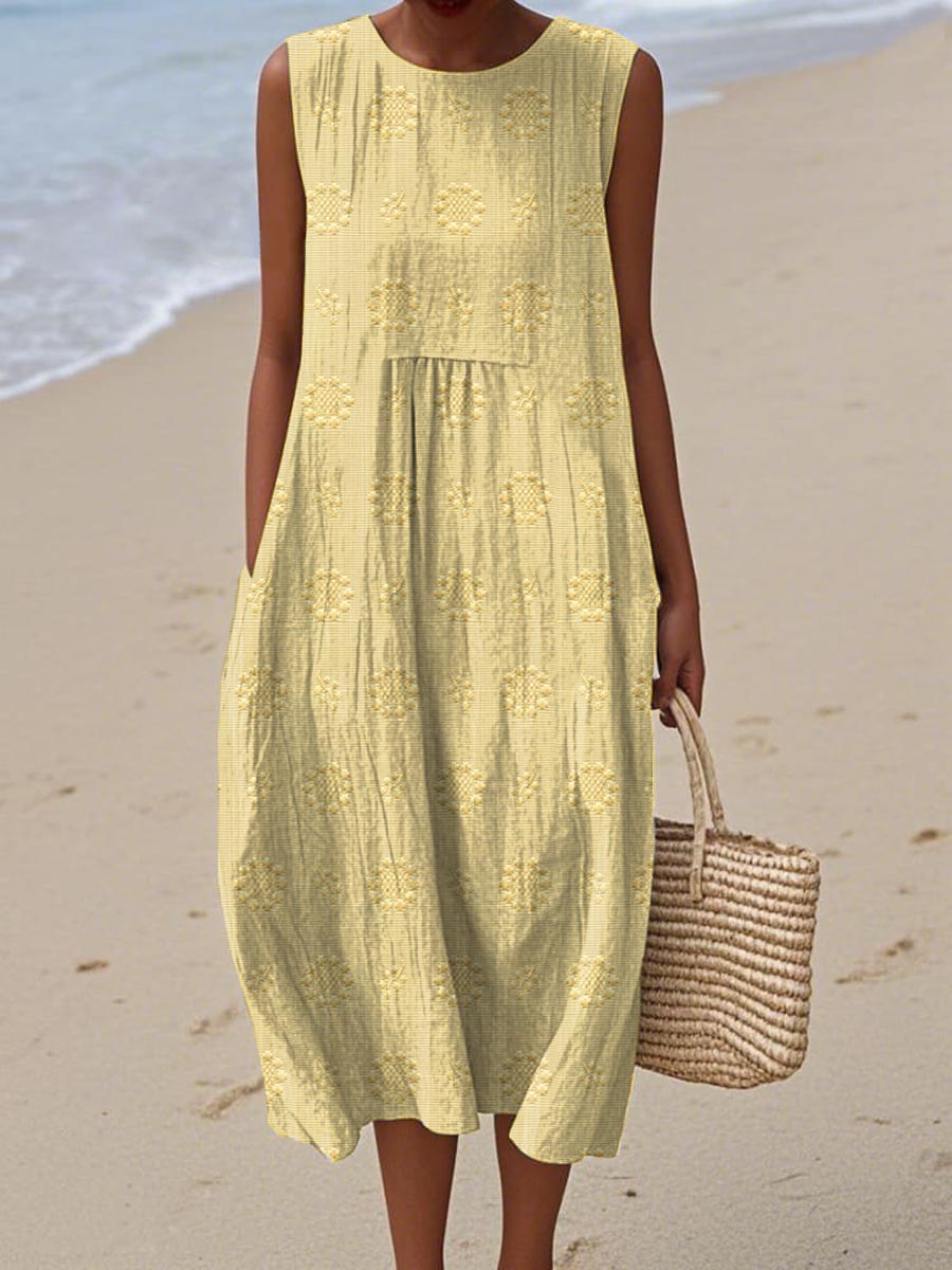 Versatile women's sleeveless midi dress with pockets. Perfect flowy, comfortable summer dress for casual or travel wear.