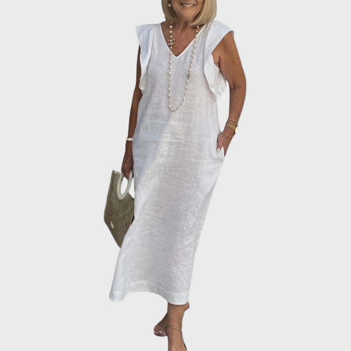 Women's sleeveless V-neck maxi dress with ruffle shoulders & pockets, perfect for summer vacation.