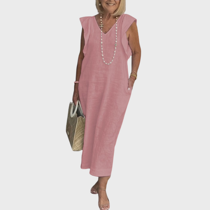 Flowy women's casual maxi dress, V-neck, sleeveless, with unique ruffle shoulders and useful pockets.