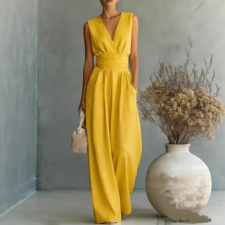 Elegant V-neck wide-leg jumpsuit for women, sleeveless and comfortable, ideal for summer events & evening wear.