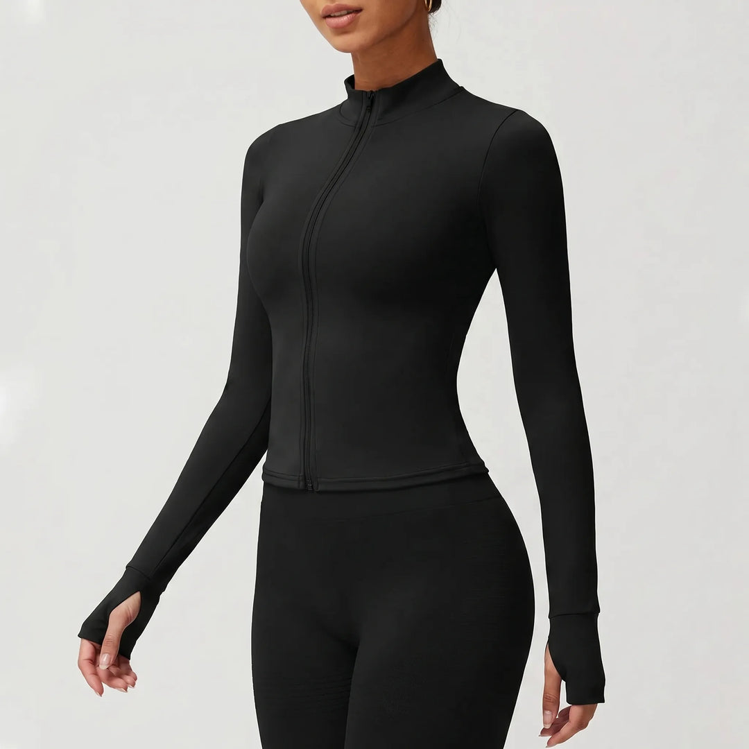 Lightweight women's zip-up athletic jacket, slim fit, perfect for performance wear and layering.