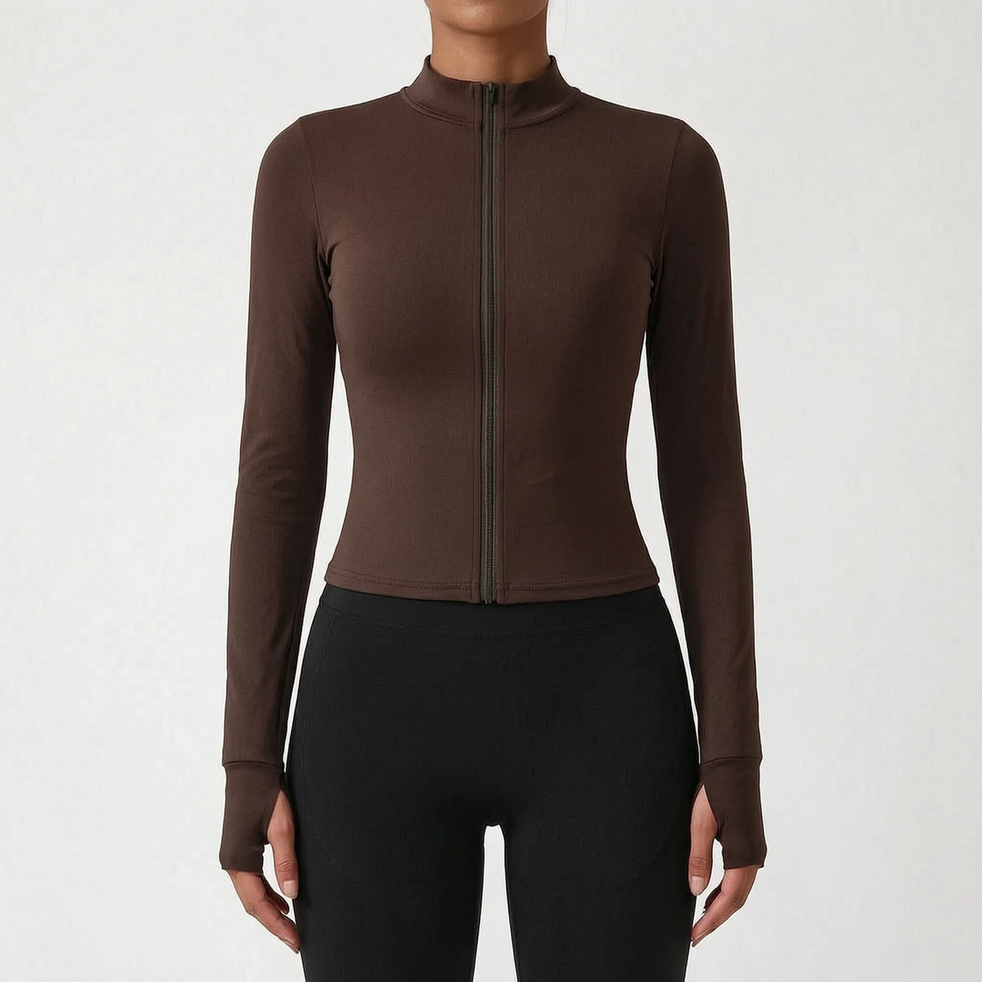 Women's active zip-up jacket, slim fit, showcasing breathable fabric and modern athletic design.