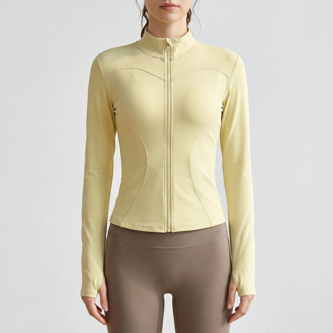 Slim-fit women's running jacket in moisture-wicking activewear fabric. Perfect for yoga and gym.