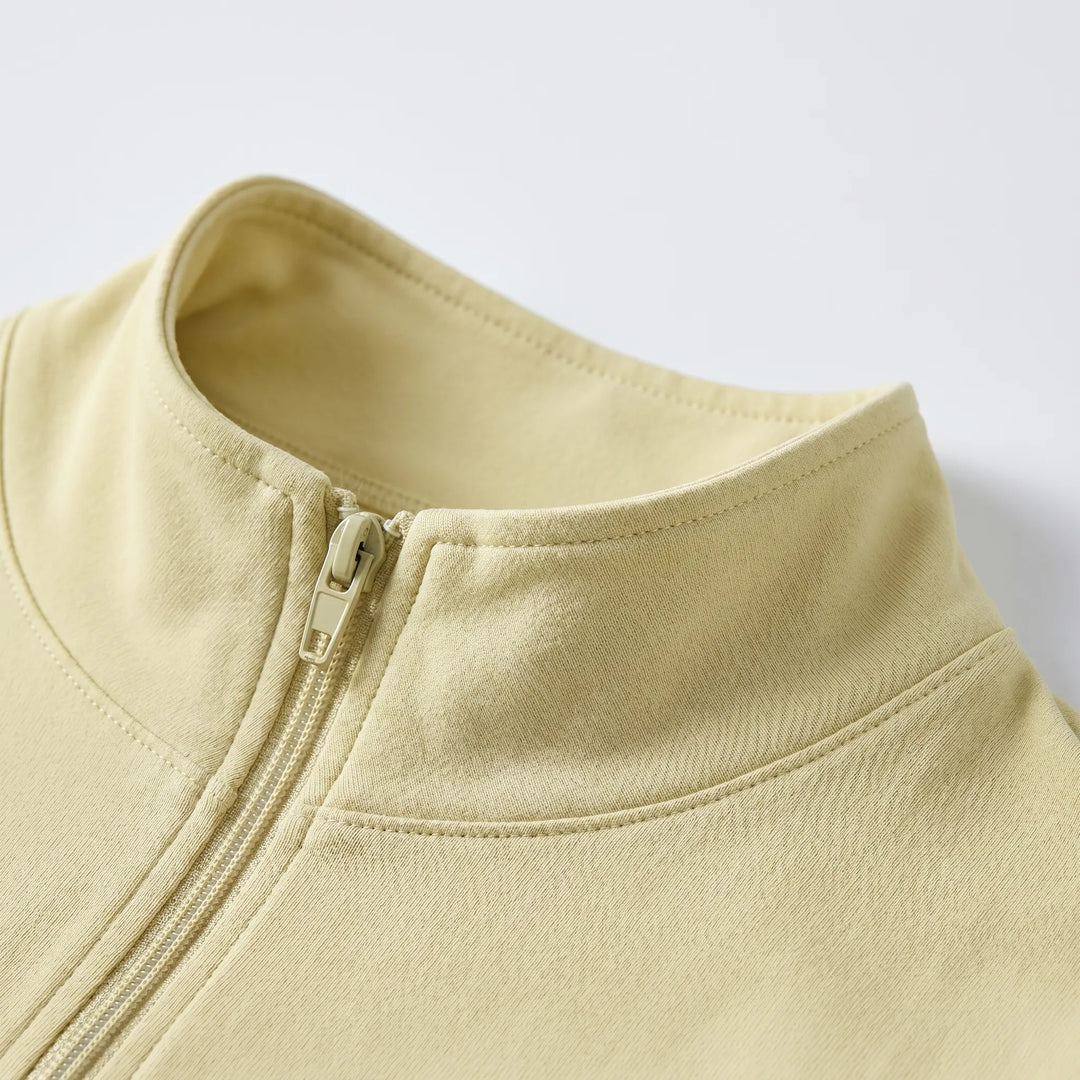 Woman in a sleek, slim-fit athletic jacket, ideal for outdoor running, yoga, and fitness activities.