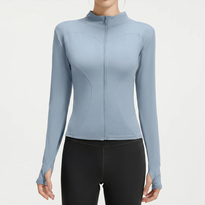 Women's performance slim-fit athletic jacket for running, yoga, and gym. Essential activewear for workouts.