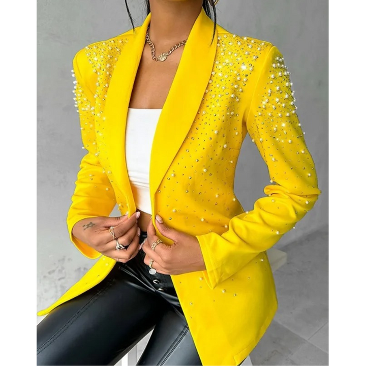 Women's slim fit blazer with elegant pearl embellishments for chic office or party wear.