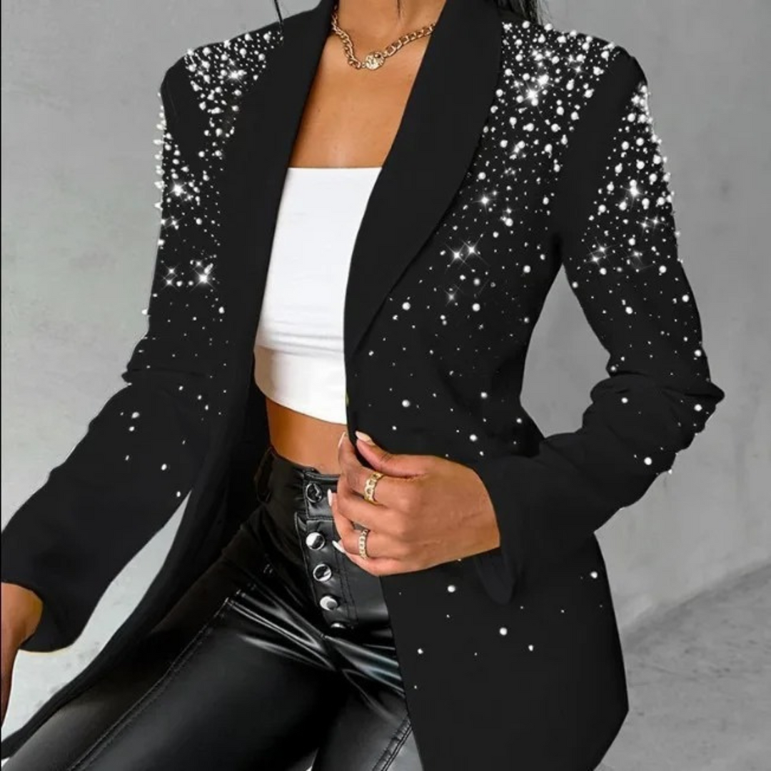 Stylish women's blazer featuring a slim fit and delicate pearl details, perfect for formal or casual outfits.