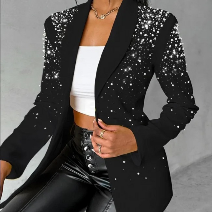 Stylish women's blazer featuring a slim fit and delicate pearl details, perfect for formal or casual outfits.