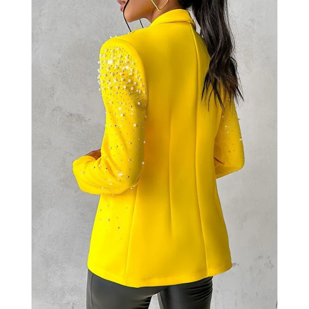 Formal women's jacket: a slim fit blazer adorned with elegant pearls, suitable for work or evening events.