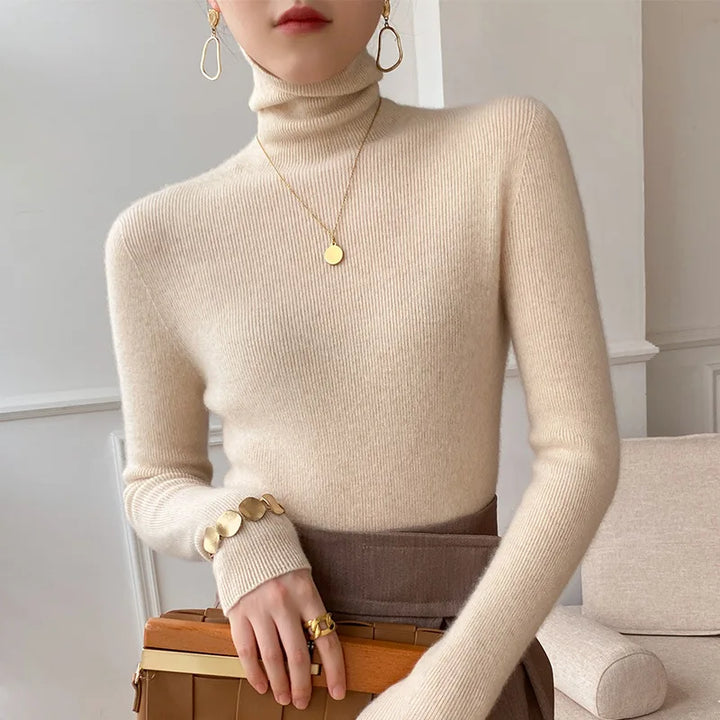 Women's slim fit everyday turtleneck sweater, a comfortable long sleeve knitwear top for fall and winter fashion.