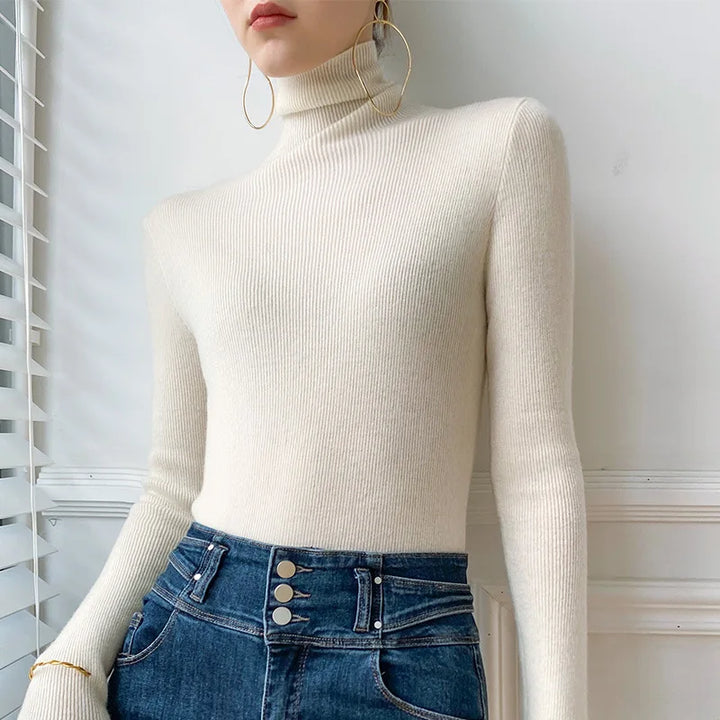 Soft knit women's slim fit turtleneck sweater, ideal for casual everyday comfort and layering in fall fashion.