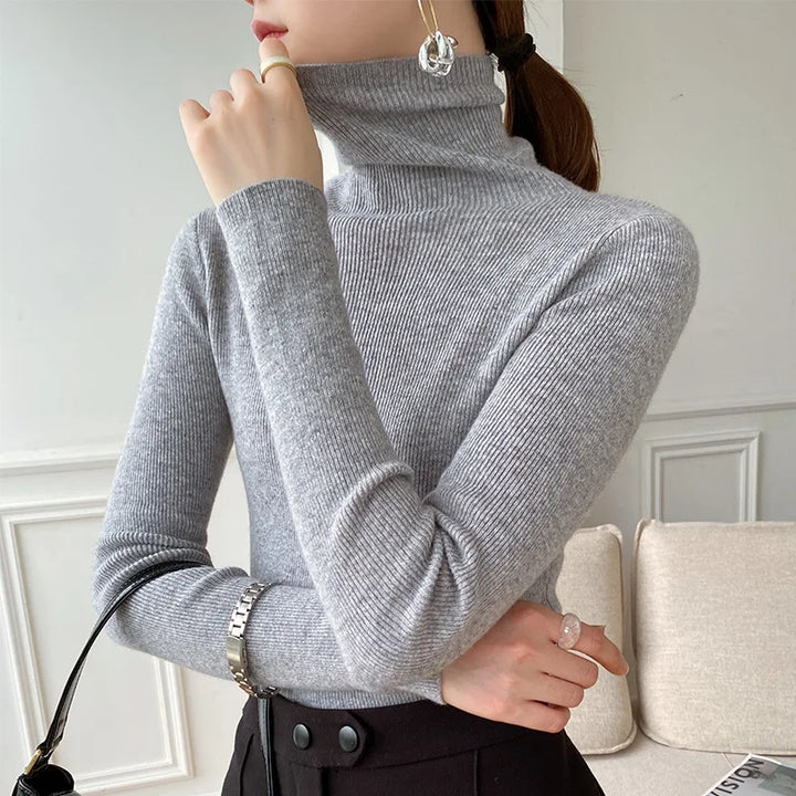 Versatile women's everyday turtleneck sweater, a long sleeve knit top essential for elegant fall & winter fashion.