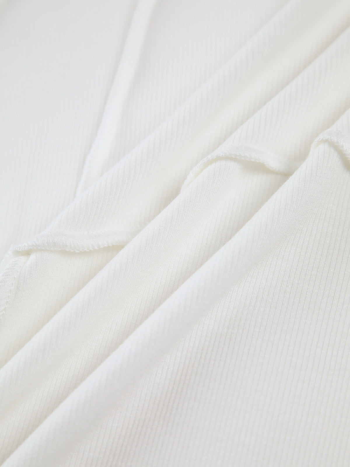 Versatile women's long sleeve top with piped trim, ideal for layering or solo wear. Casual & chic.