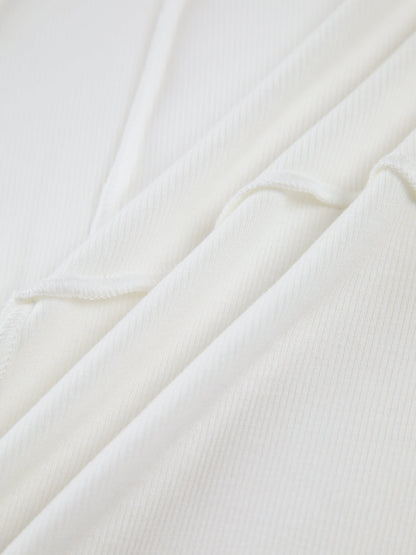 Versatile women's long sleeve top with piped trim, ideal for layering or solo wear. Casual & chic.
