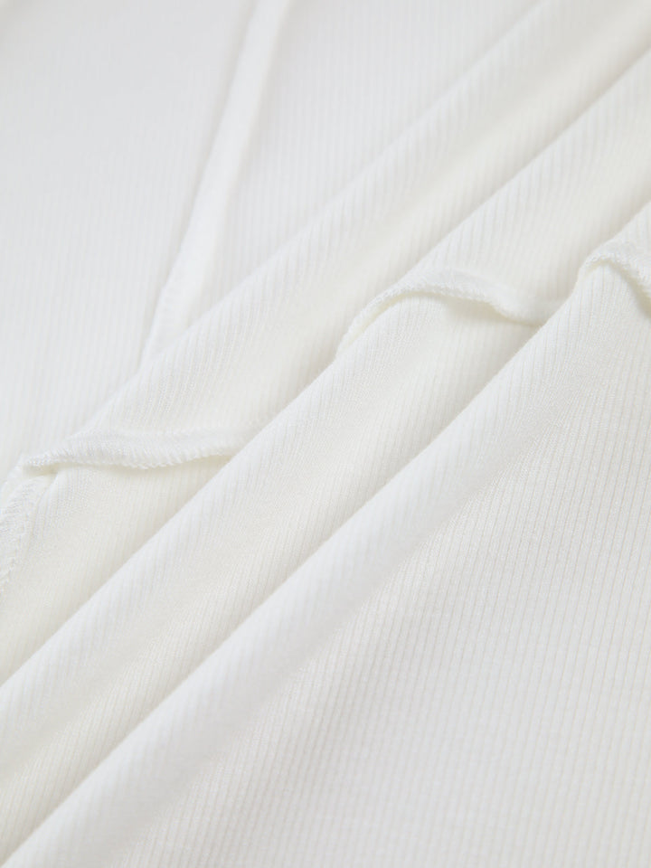 Versatile women's long sleeve top with piped trim, ideal for layering or solo wear. Casual & chic.