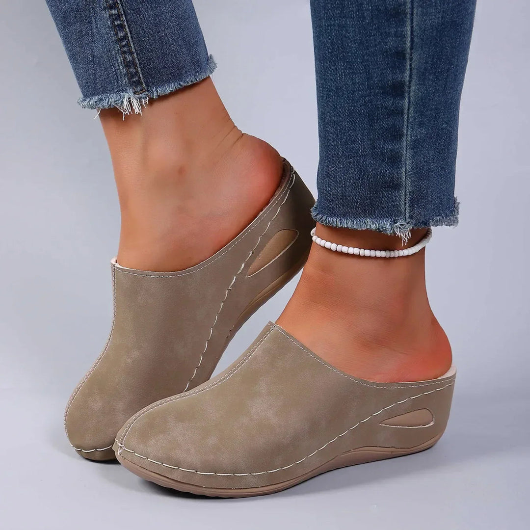 Stylish women's slip-on clogs for ultimate comfort. Lightweight, cushioned footwear perfect for versatile everyday wear.