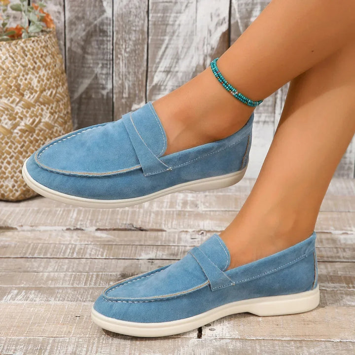Elegant women's loafers, slip-on comfort and stylish design for versatile office to casual fashion.