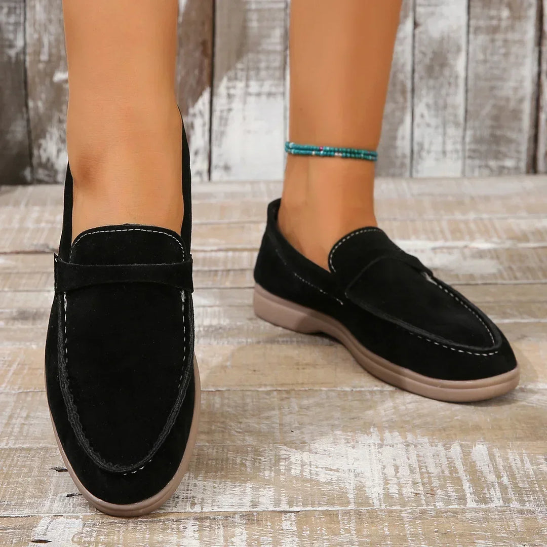 Modern women's slip-on loafers, soft cushioning & durable rubber sole for stylish casual wear.