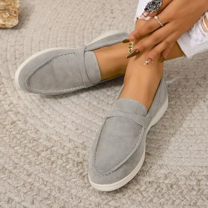 Cushioned women's loafers with rubber sole, easy slip-on style for all-day comfort.