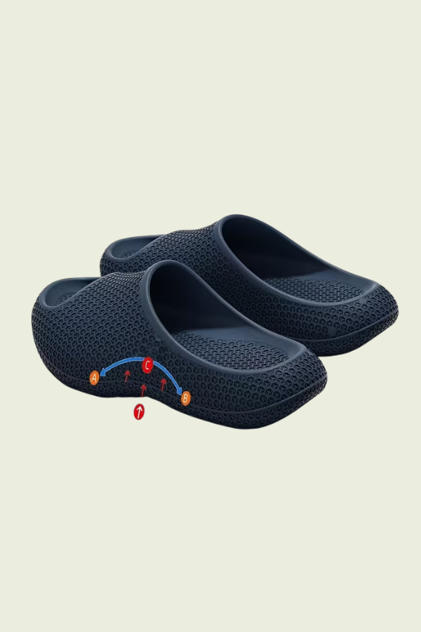 Comfortable women's daily wear slip-on slippers with arch support, ideal for cozy home use.