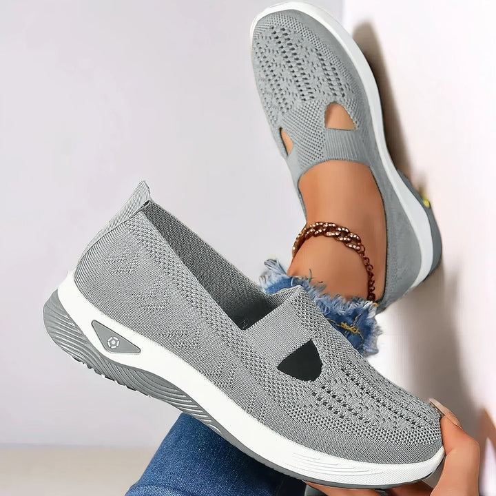 Comfortable women's walking shoes. Slip-on design with arch support for daily wear.