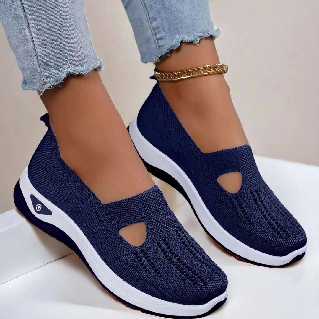 Supportive women's slip-on sneakers for summer. Breathable casual footwear with arch support.