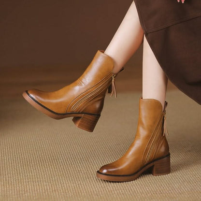 Brown Sloane high-heel ankle boots for women, elegant and versatile fall/winter footwear.