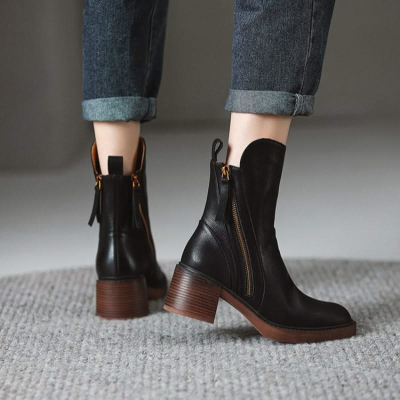 Premium black high-heel ankle boots by Sloane, stylish women's fall & winter footwear.