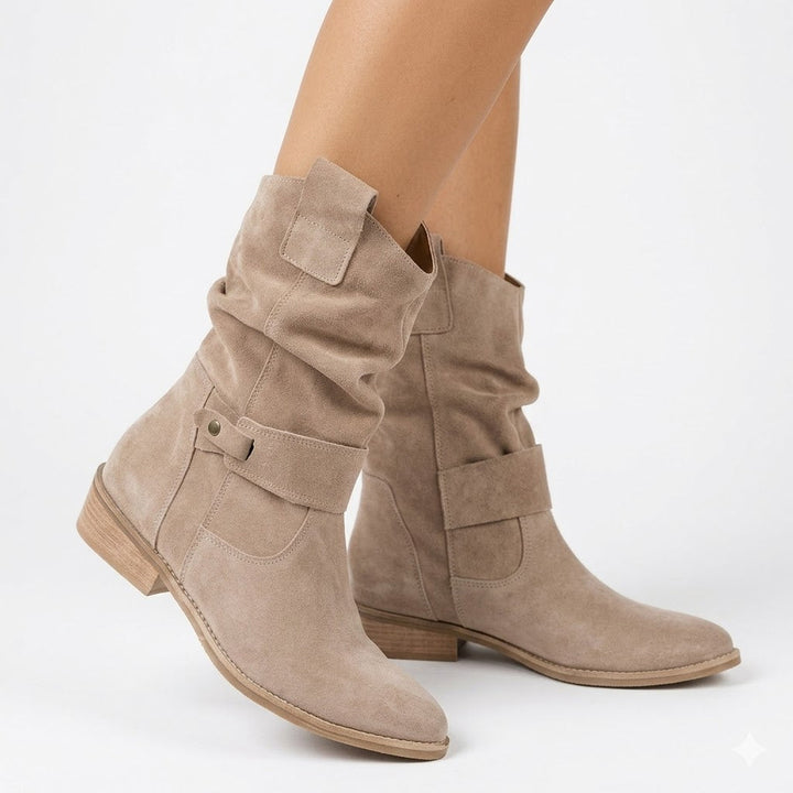 Women's slouchy ankle boots with low heel and stylish buckle strap, ideal for casual fall fashion.