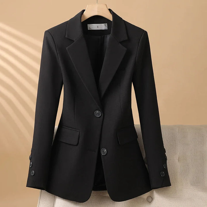 Polished women's tailored blazer, a smart long sleeve jacket for business attire & office professional fashion.