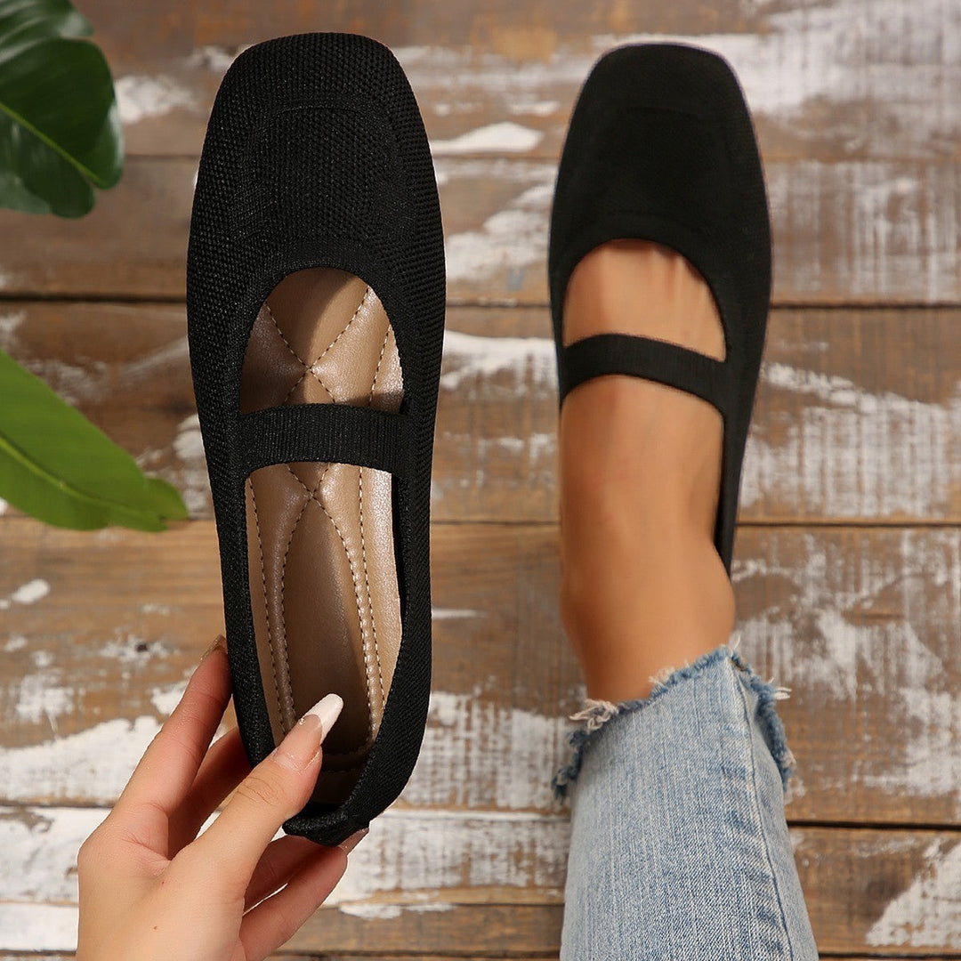 Women's smiling face Mary Jane ballet flats. Comfortable, stylish slip-on casual shoes for everyday fun.