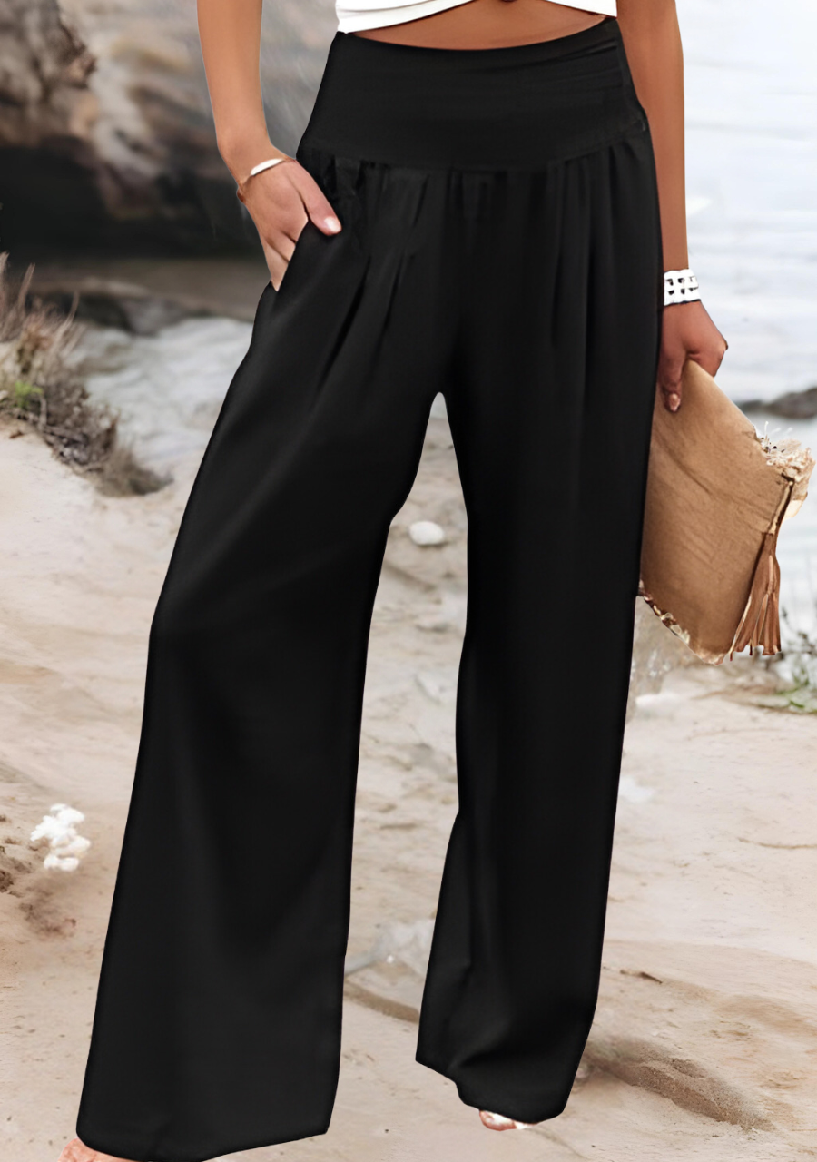 Comfortable women's wide leg pants with a smocked high waist, ideal for vacation and casual wear.