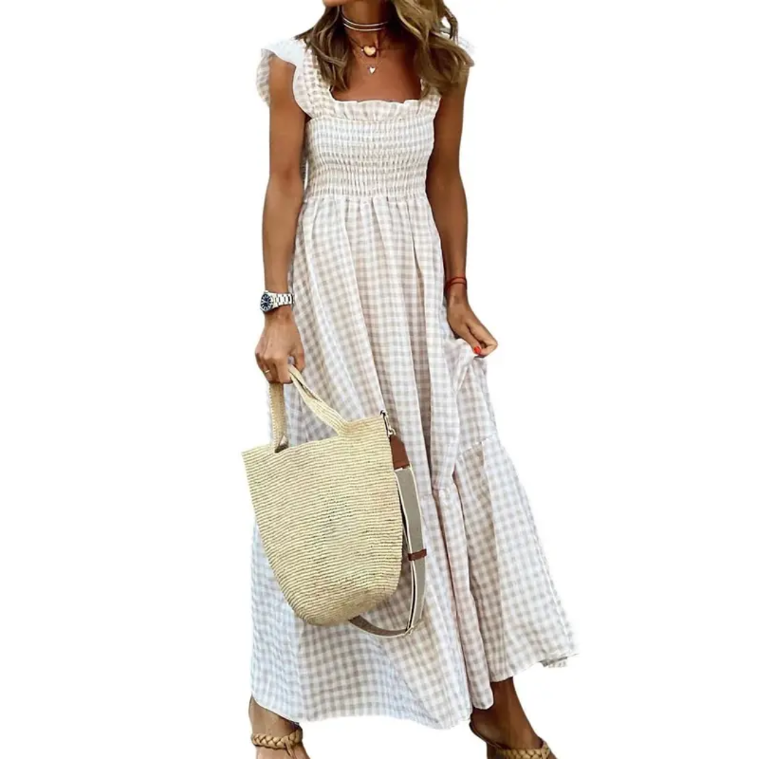 Women's smocked tiered maxi dress, flowy and comfortable. Ideal for summer vacations, spring fashion, or casual wear.