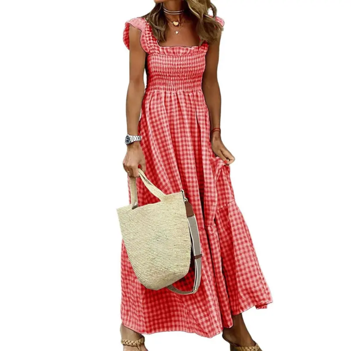 Elegant women's tiered maxi dress with smocked bodice for a flattering, flowy fit. Perfect for spring/summer fashion.