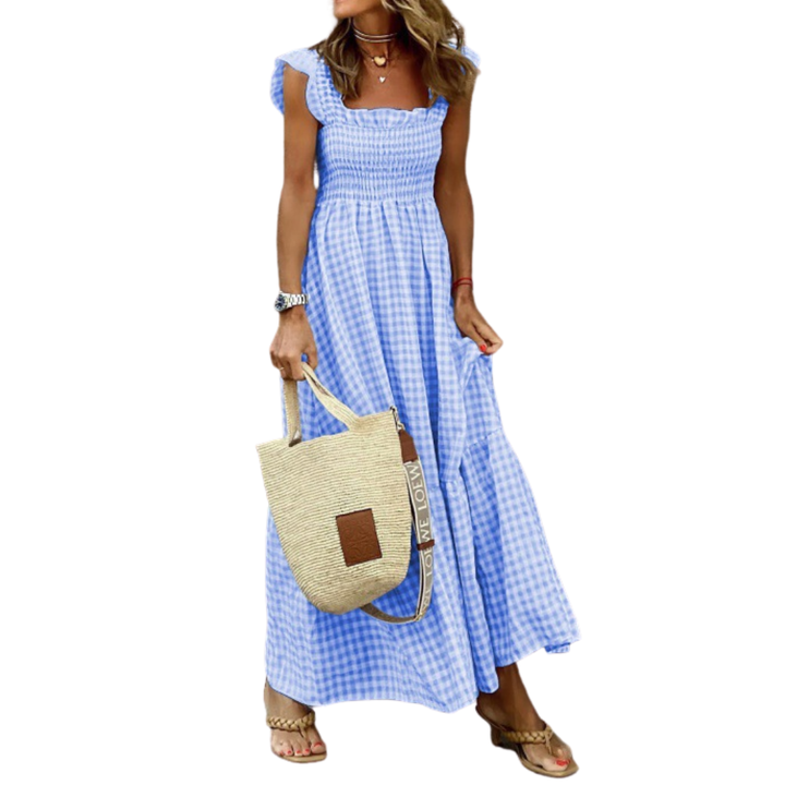 Comfortable women's smocked maxi dress, featuring multiple tiers. A versatile, flowy dress for summer and spring style.