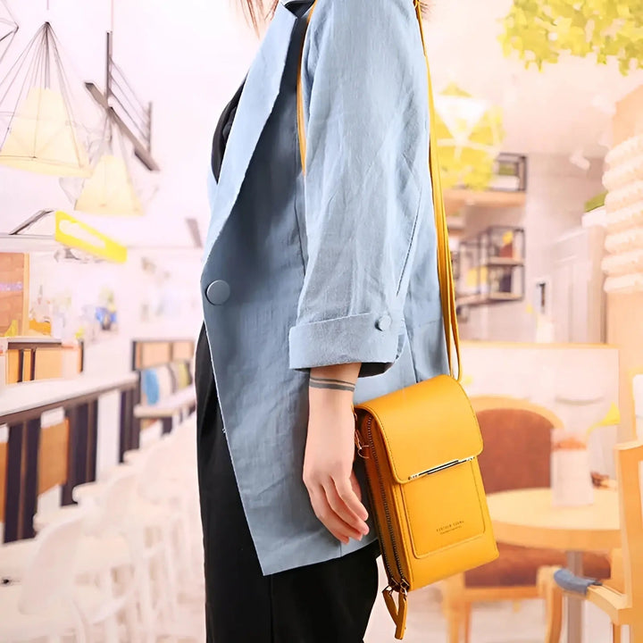 Spacious interior of a women's soft leather anti-theft shoulder bag, organized for daily essentials.