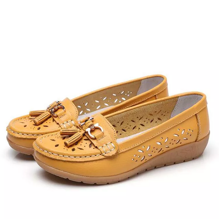 Elegant women's moccasin sandals, combining summer style with essential arch support.