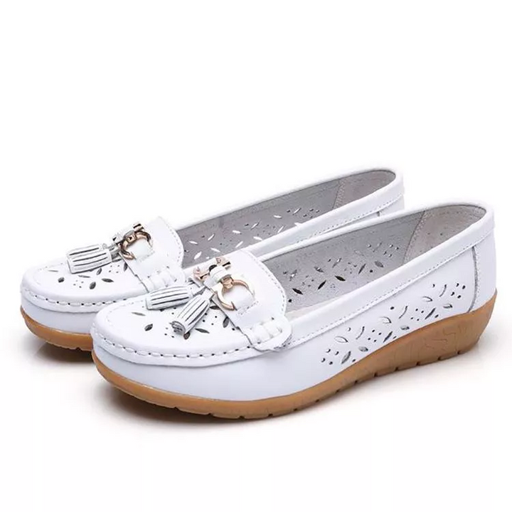 Lightweight slip-on moccasin sandals for women, offering breathability and flexible movement.