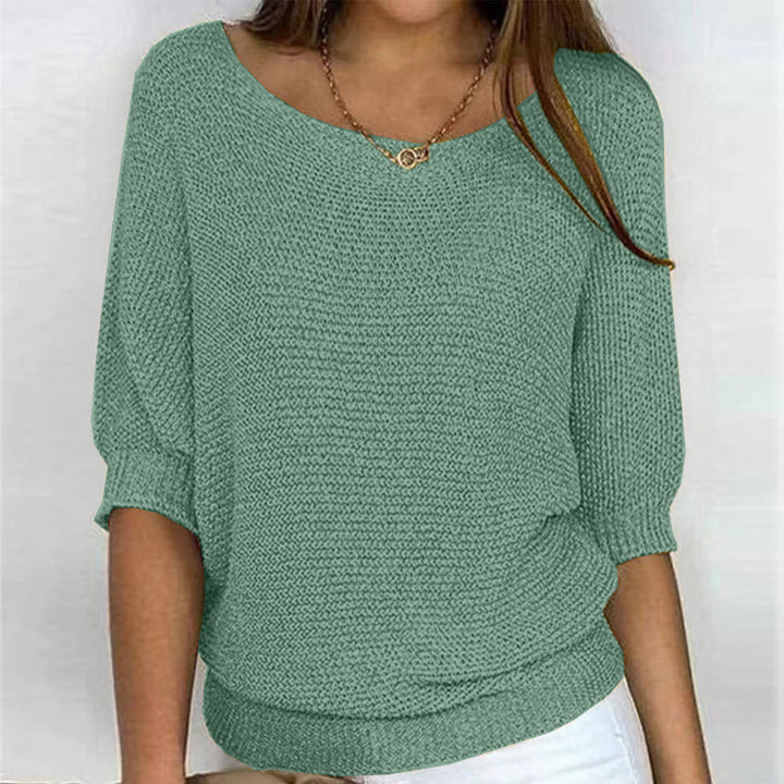 Plush, soft women's long-sleeve comfort sweater for cozy winter wear and elegant style.