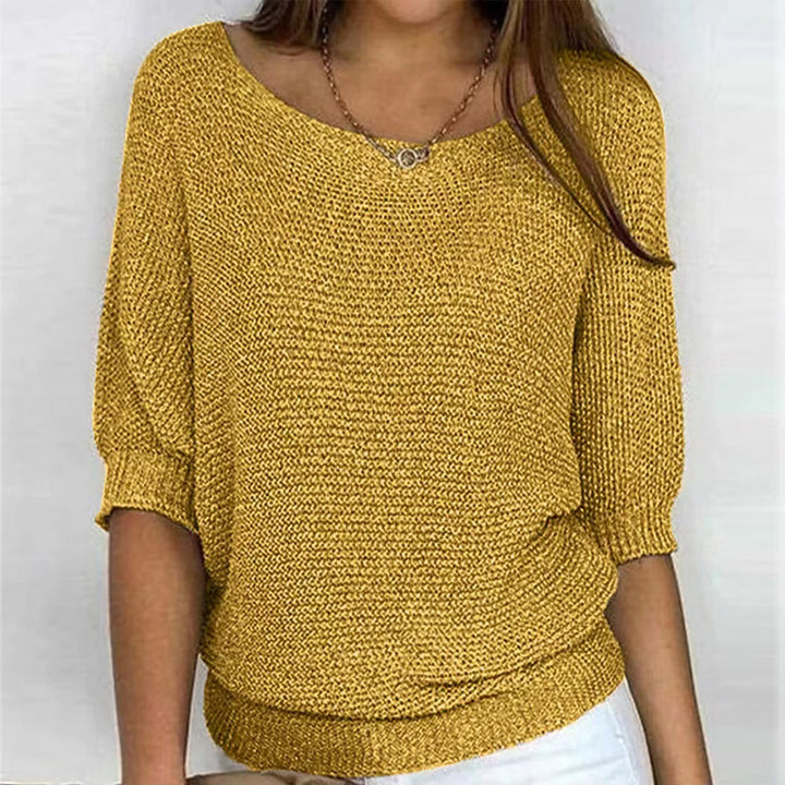 Women's long-sleeve comfort sweater. Soft knit pullover for casual style and easy layering.