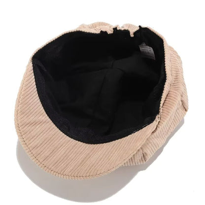 Vintage-inspired women's corduroy cap. Soft, comfortable accessory adding effortless style to any casual outfit.