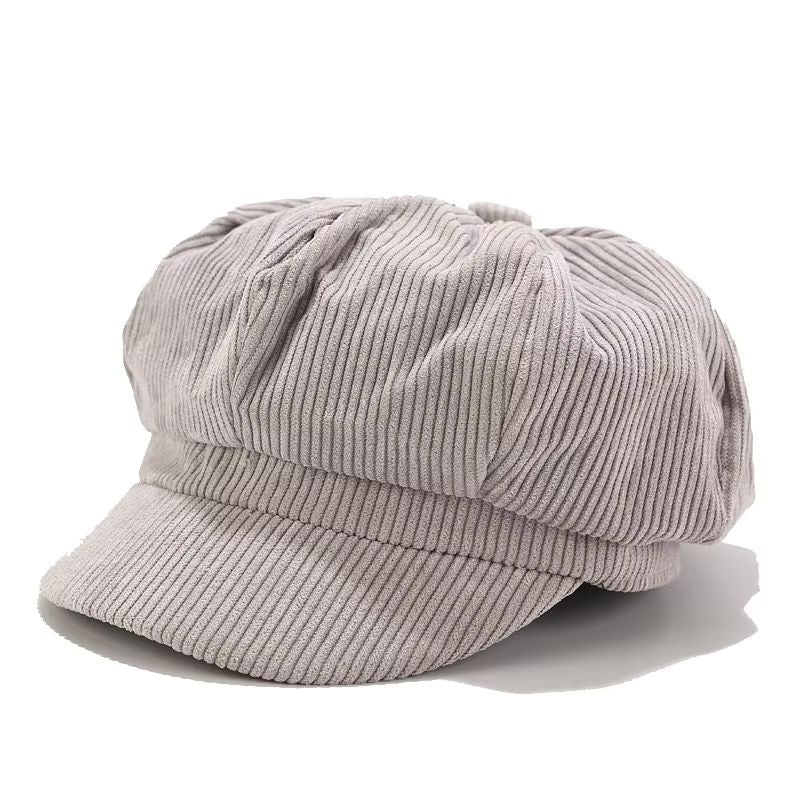 Close-up of a women's soft corduroy cap, showcasing its unique texture and casual, stylish design.