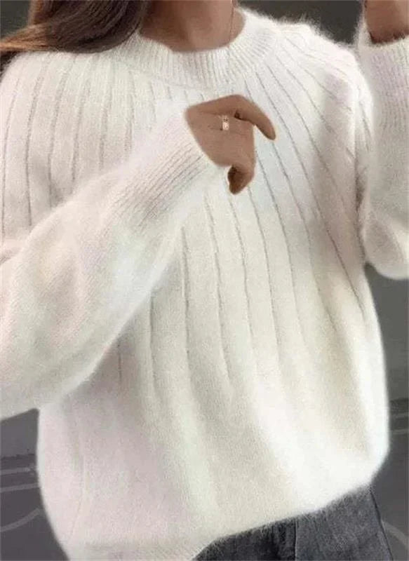 Soft textured knit women's sweater. Comfortable & cozy long-sleeve pullover, ideal for fall and winter.