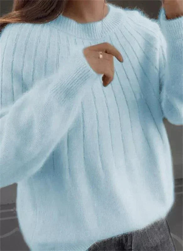 Women's one-size cozy textured knit sweater. Soft long-sleeve pullover, stylish for any fall/winter look.