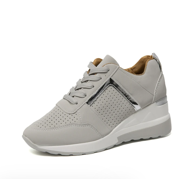 Breathable women's casual sneakers featuring soft cushioning & supportive design for all-day comfort.