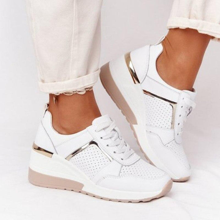 Flexible women's comfort sneakers. Breathable design with soft cushioning for all-day wear & casual style.