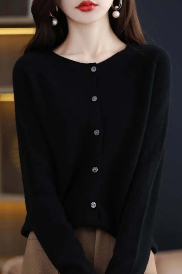 Stylish women's long cardigan, soft knit fabric with buttons, great for layering and comfort.