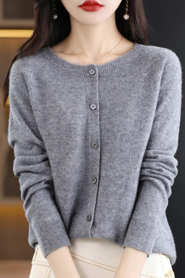 Casual chic women's long button-front cardigan, a comfortable and essential everyday layering piece.